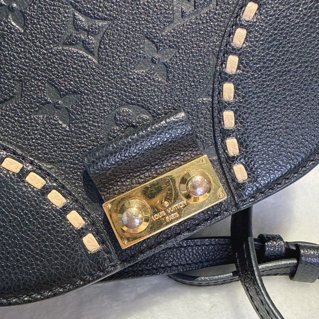 【#068】Pre-owned Louis Vuitton Junot Monogram Empreinte Black Leather Saddle Bag