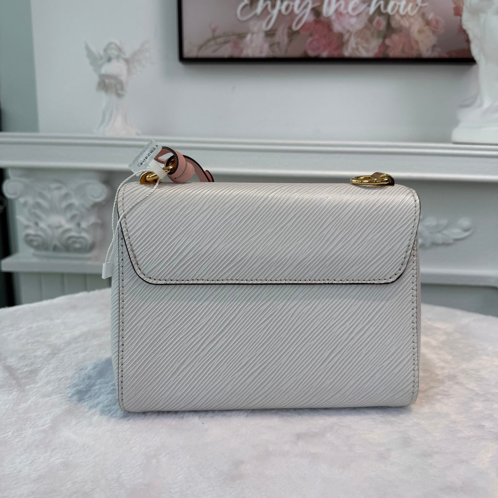 【#276】Pre-owned Louis Vuitton Twist MM Bag Epi Leather in White with Gold-Tone Hardware & Floral Bag Charm